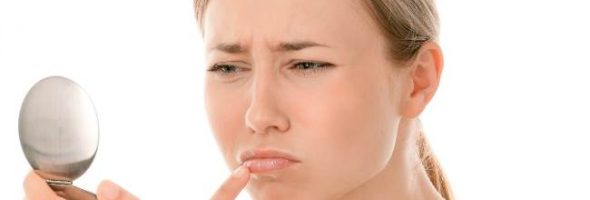 Начальная стадия герпеса на губах